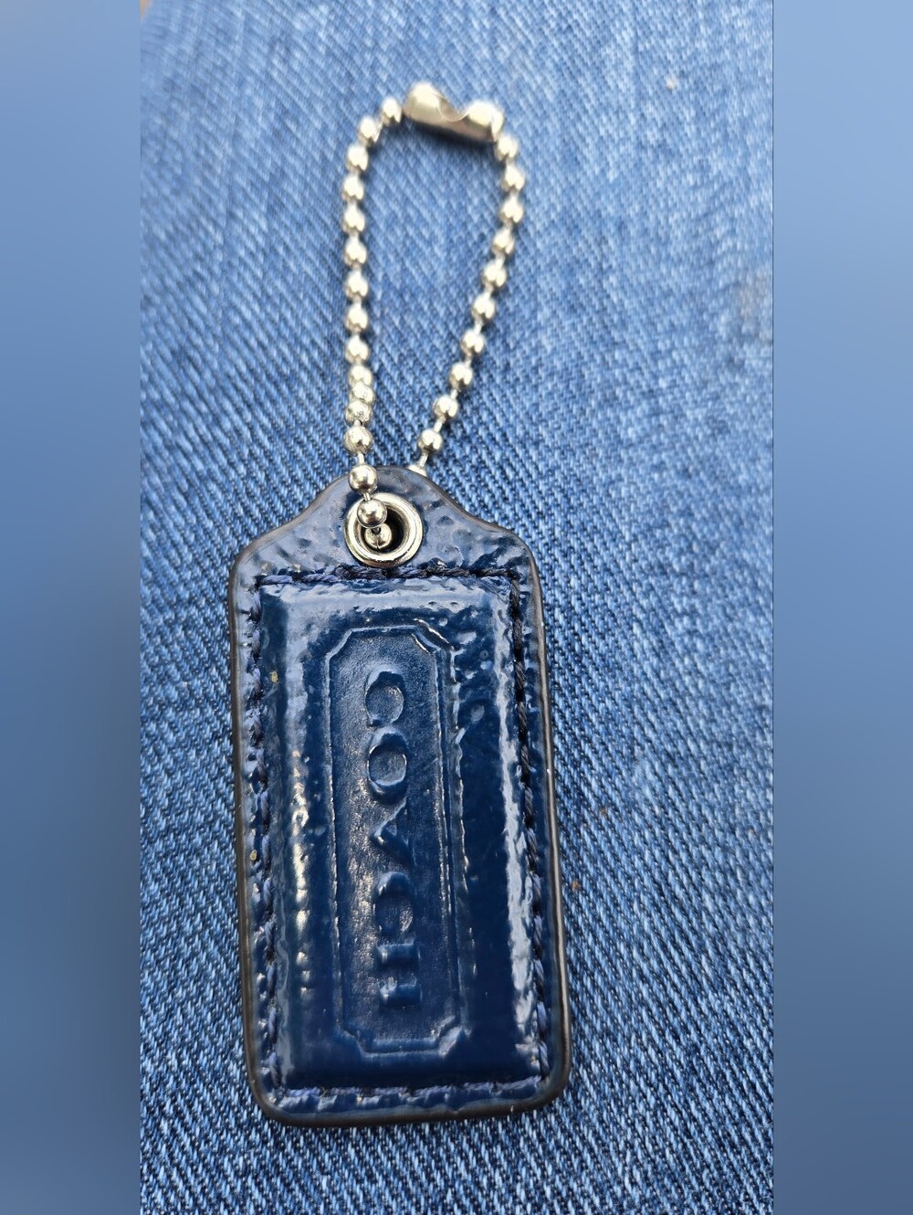 Navy Blue Coach Tag